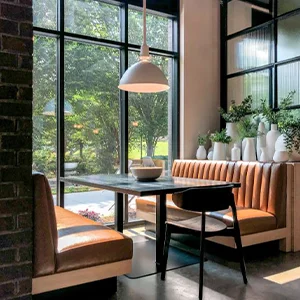Window-Side Restaurant Booth Seating with Natural Light